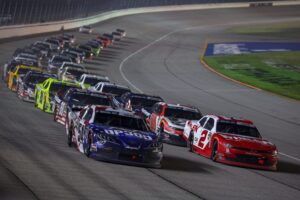 James Gilbert | Getty Images Cars line up for a restart in the O'Reilly Series at Chicagoland Speedway.